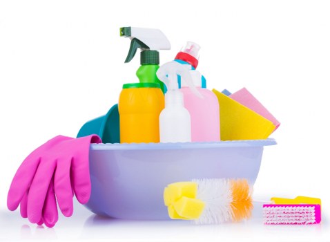 Carpet cleaning operative applying safety measures during a service